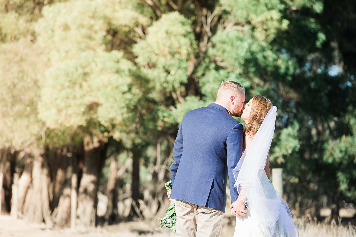 Wedding at D'angelos Winery, Officer kiss