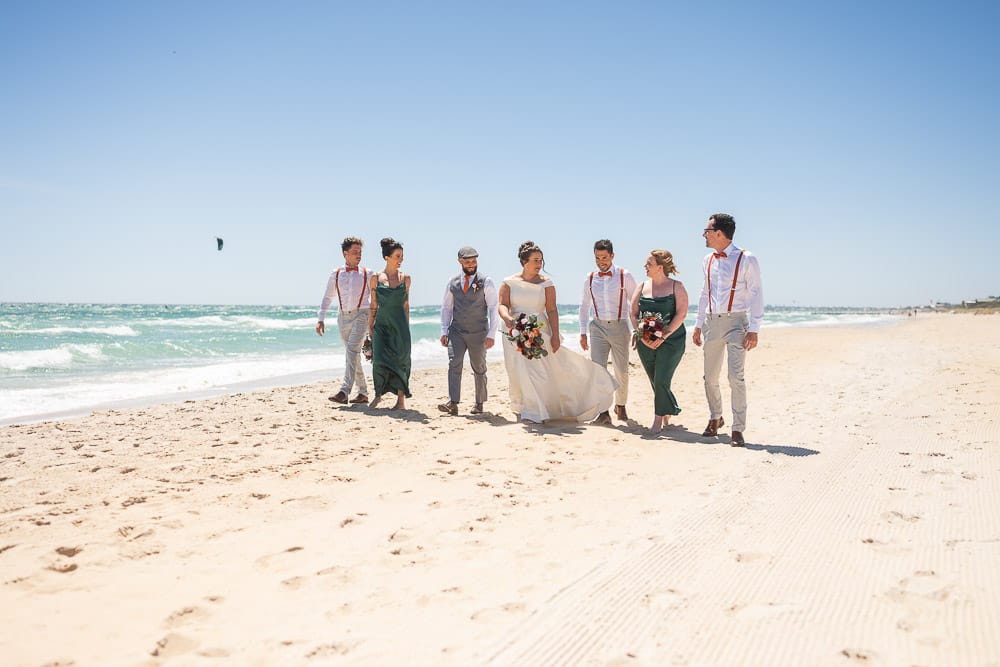 bridal party on beach